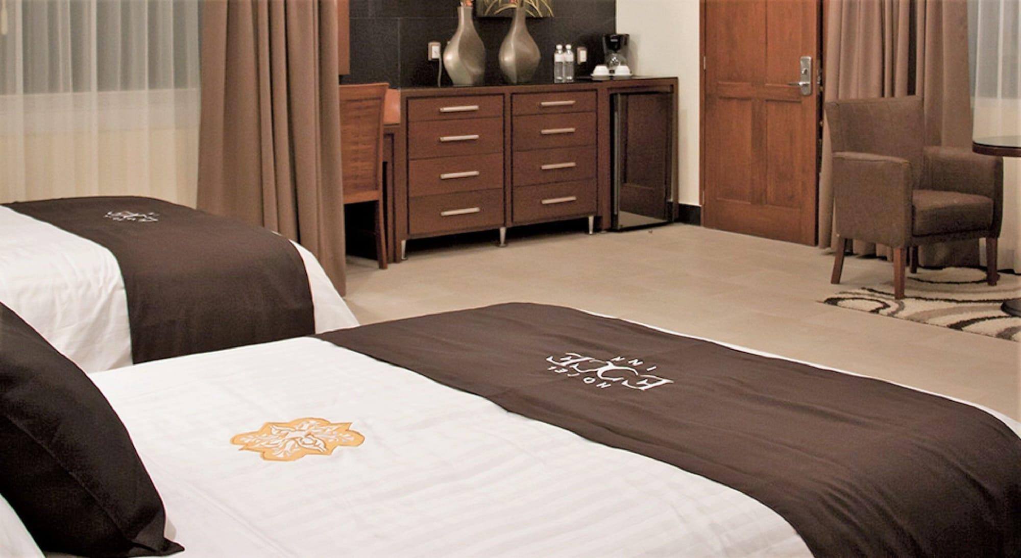 סילאו Hotel Ecce Inn & Spa מראה חיצוני תמונה A bed runner