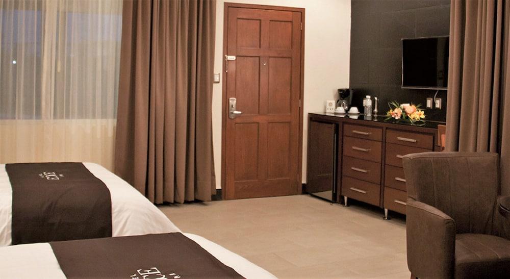 סילאו Hotel Ecce Inn & Spa מראה חיצוני תמונה A typical room at the hotel