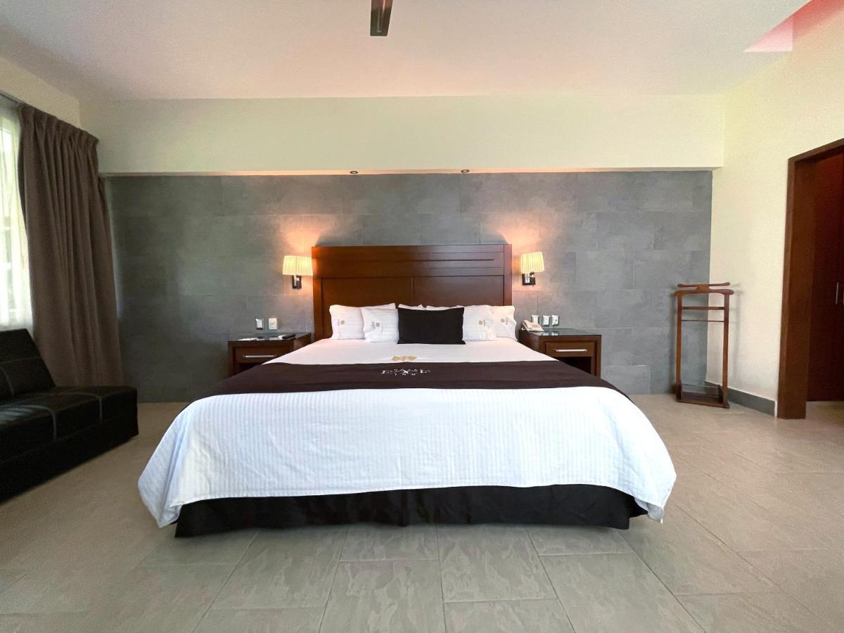 סילאו Hotel Ecce Inn & Spa מראה חיצוני תמונה A bedroom at the hotel
